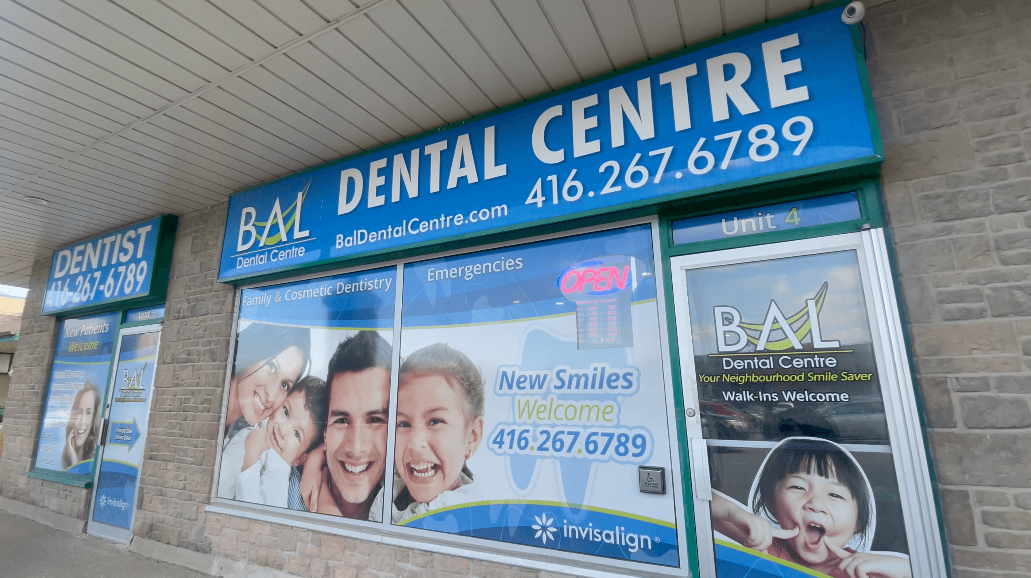 Dentist with smiling patient at Bal Dental Centre