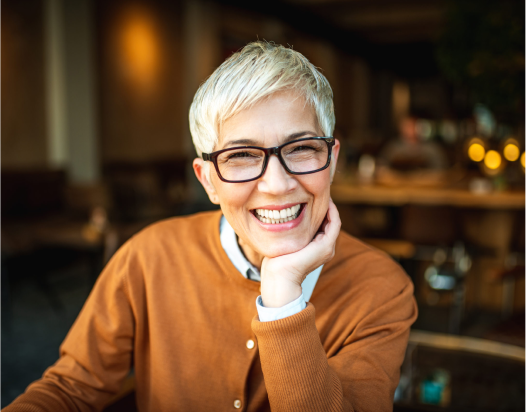 Senior woman smiling — affordable dentistry